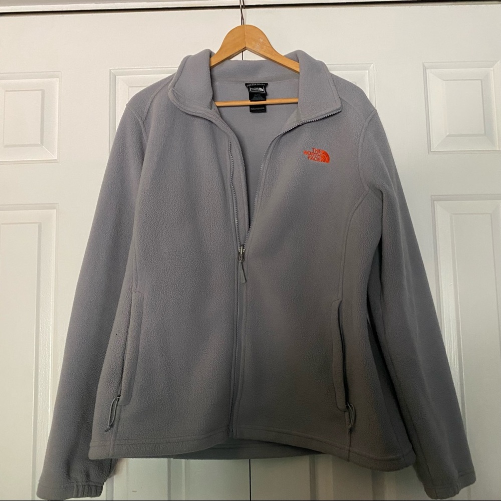 Grey North Face Jacket with Orange Lettering